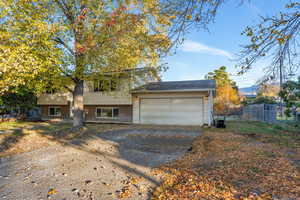 Two car garage with deep driveway