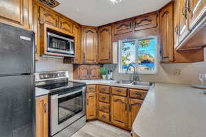 Window over the sink provides natural light