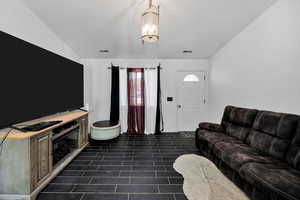 Living area featuring a chandelier