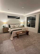 Carpeted bedroom with baseboards