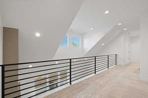 Hallway featuring carpet floors and recessed lighting