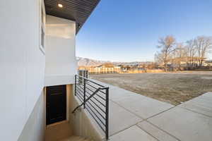 View of patio with a mountain view and a residential view