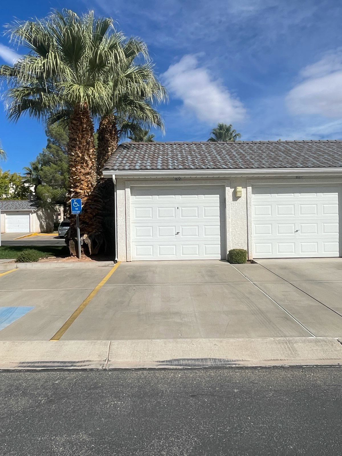 Garage featuring driveway