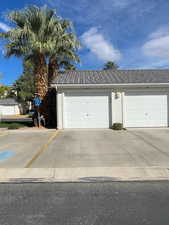 Garage featuring driveway
