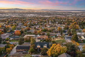 Aerial view of property's location featuring mountains