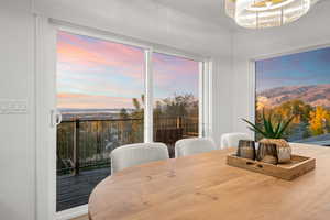 Dining area featuring plenty of natural light and a chandelier