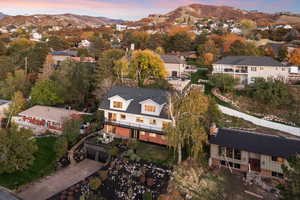 Aerial view at dusk of a mountain view and a residential view
