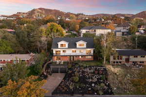 Aerial view at dusk of a mountain view and a residential view