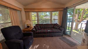 Sunroom with lofted ceiling