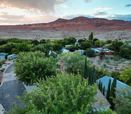 View of mountain background with a tree filled landscape