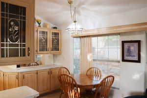 Dining space with a chandelier