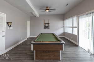 Playroom with billiards, dark wood-style flooring, a ceiling fan, and a textured ceiling