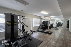 Gym with a textured ceiling
