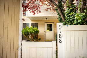 Entrance to property featuring a gate