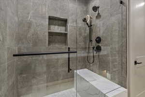 Bathroom featuring a shower stall
