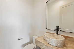 Bathroom with vanity and toilet