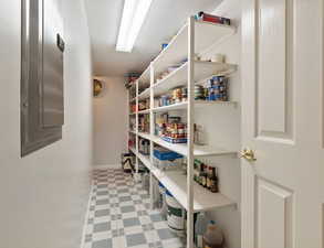 Pantry featuring electric panel