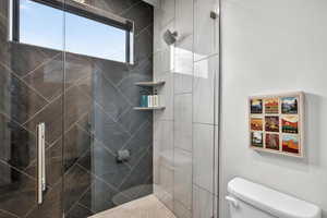 Bathroom with tiled shower