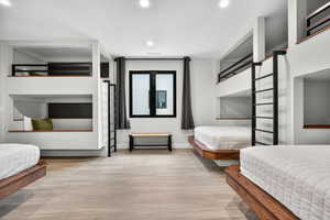 Bedroom featuring recessed lighting and baseboards