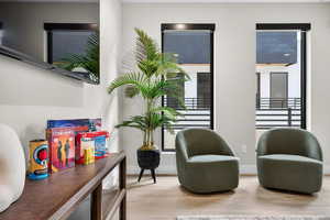 Living area featuring wood finished floors and baseboards