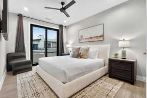 Bedroom with light wood-style flooring, access to outside, a ceiling fan, and recessed lighting