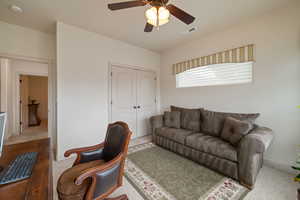Office featuring ceiling fan and carpet floors