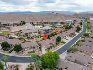 Aerial view of residential area with a mountainous background