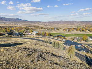 View of mountain backdrop with nearby suburban area
