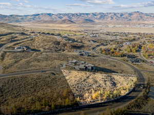 Aerial overview of property's location featuring mountains and rural landscape