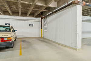 Private parking space with controlled access and storage locker.