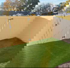 View of yard with a gate