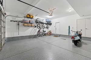 Garage featuring a garage door opener