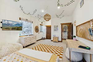 Bedroom featuring recessed lighting and light carpet