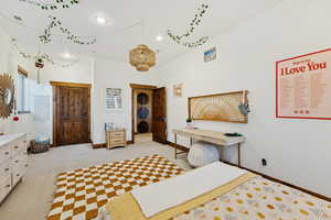 Bedroom featuring light carpet and recessed lighting