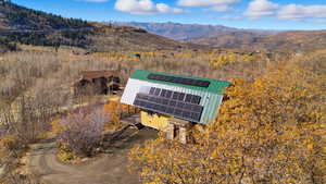 View from above of property with a mountainous background