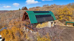 View from above of property featuring a forest