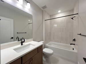 Full bathroom featuring  shower combination and vanity