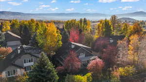 View of subject property with a mountain backdrop