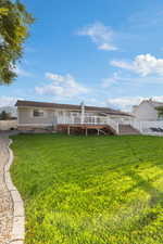 View of front of house with a deck