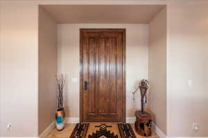 Entryway featuring baseboards