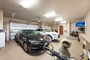 Garage featuring a garage door opener