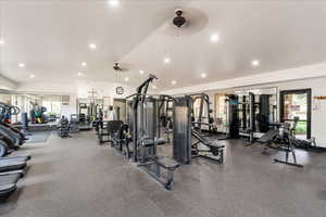 Club House Exercise room with a ceiling fan, recessed lighting, and lofted ceiling