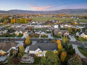 Aerial view of residential area featuring a mountain backdrop