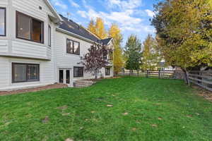 View of fenced backyard