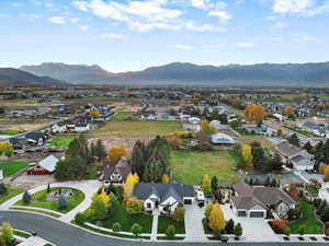 Aerial perspective of suburban area with a mountain backdrop