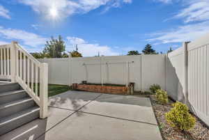 Fenced backyard featuring a patio area