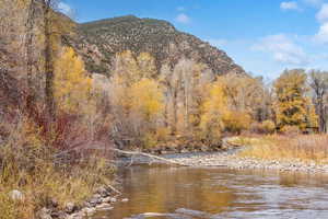 View of mountain background featuring a large body of water