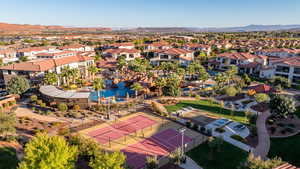 Aerial perspective of suburban area with a mountain backdrop