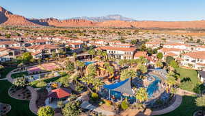 Aerial view of residential area featuring mountains