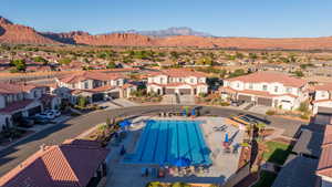 Aerial view of residential area with a mountain backdrop